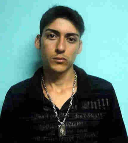 POLÍCIA DIVULGA NOME E FOTO DE ACUSADO DA MORTE DE PROFESSOR; MATADOR PODE ESTAR NA CAPITAL