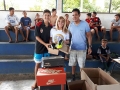 Semes entrega tênis para alunos do Mato Grosso, material esportivo no Triângulo e anuncia Rua de Lazer no Orgulho do Madeira