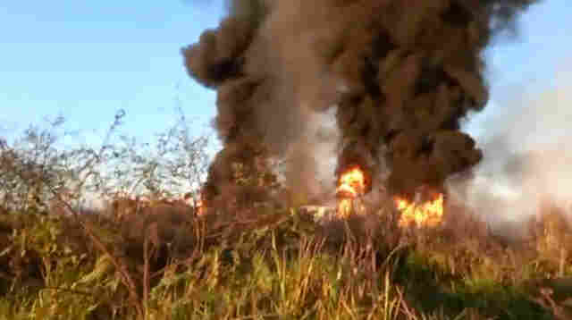 Brigadista filma local de colisão entre ônibus e caminhão-tanque e pede helicóptero para apoio