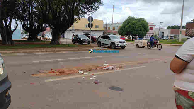 Mulher por pouco não é esmagada por carreta na capital